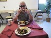 Cisco samples the food. 
