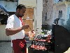 Applying commercial sauce.