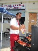 During the summer Terrell Ortiz cooks outside on a large grill.