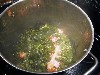 A simmering pot of collard greens.