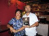 Sabrina and Chin Lee display an award they won for their ribs. 
