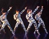 Harlequin like costumes for Resurrection by  Isaac Mizrahi