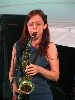 Manning plays alto sax.