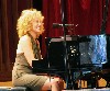Carmichael is known for her vintage style of stride piano.