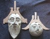 Masks of an Ainu man and woman