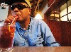 Pancho takes a hit on the iced tea.