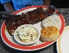 The full rack of St. Louis style with slaw, garlic mashed and a biscuit. 