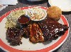 The sample  plate with ribs, steak tips and chicken breast. 