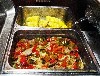 Corn with Italian sausage, peppers and onions. 