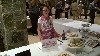 Rebecca Zolla of Crumbs... Cookies and Cakes, presides over her hand decorated cookies and cupcakes