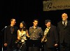 Kelly and the band taking a bow.