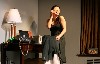 Xi (Jennifer Lim) makes a call from Daniel&rsquo;s bedroom. 