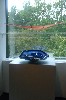 Decorative Arts Gallery Installation Overlooking the MFA’s Japanese Garden includes Endeavor, 2000 by Lino Tagliapietra, Italian, born in 1934, Blown and battuto (carved) glass and Seaform Set, about 1982 by Dale Chihuly, American, born in 1941, Blown glass.
