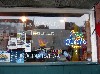 Looking through the window.