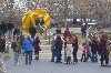 Tabachin Ribbon, a 13 foot tall yellow painted steel sculpture by Yvonne Domenge, 2011, photo by M. Favermann