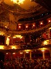 The theatre and audience before the play&rsquo;s beginning.