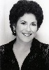 Judy Kaye brings us a hopeful message: we can have riches, fame and power without working. Just ask Santa