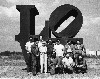 Robert Indiana and the Lippincott crew stand in front of "LOVE," 1970. Cor-Ten steel. 12’ x 12’ x 6’. Indianapolis Museum of Art, IN. © 2010 Morgan Art Foundation / Artists Rights Society (ARS , New York, NY. Photograph by Tom Rummler.