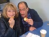 Karen MacDonald and Will LeBow Sharing a Donut