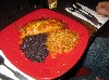The quesadilla was small, flat and lacked filling with mediocre rice and beans. 