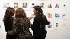 At the vernissage, discussing portraits.