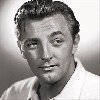 Robert Mitchum told the judge that he smoked up to three marijuana cigarettes a day.