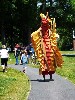 Abigail Elwood, the stilt performer, as a Chinese Tomb Guardian Lion.