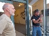 Berkshire Eagle art critic, Keith Shaw, left chats with artist/ gallerist Thor Wickstrom.