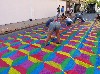 Bending into the work.