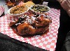 The barbecue chicken plate with a sweet and tangy sauce.