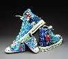 The beaded tennis shoes of Teri Greeves.