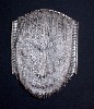 This mask was carved from a book by Nicholas Galanin.