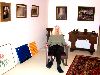 Jane Hudson sits in her exhibition at North Adams Antiques.