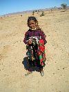 Child selling crafts