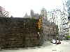 Approaching with the wall of the jail on the left.