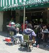 Musicians serenade the patrons of the cafe.