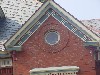 Oxeye Window and Decorative Moulding Detailing on Late Victorian House, North Adams, MA.
