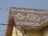 Decorative Roof Shingle Design with Carved Bargeboard on Late Victorian House in North Adams, MA