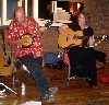 Fran on mandolin and Lisa on guitar.