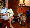 Tony Pisano on accordian and his son Josh playing hand drums.