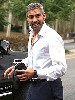 George Clooney is the sex obsessed Harry Pfarrer.