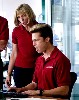 Brad Pitt (Chad) and Frances McDormand (Linda)open the alleged CIA disc.