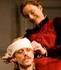Arkadina ineptly binds the self inflicted wound of her son Konstantin (Mackenzie Crook).