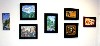 An arrangement of paintings by Thor Wickstrom.