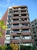 Apartment house with window air conditioners in Izmir