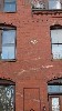 Brickwork and Ceramic Patterned Detail Rosette on Monmouth Court, Brookline, MA, c.1875., architect J. Pickney Putnam.