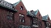 Unusual Building detailing and Roofline on three conjoined houses at 8,10 and 12 Aberdeen Street, Boston, MA. Notice the round windows and copper edging.