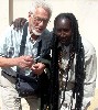 Yuri Tuvim embraces MBaye Sarr,
